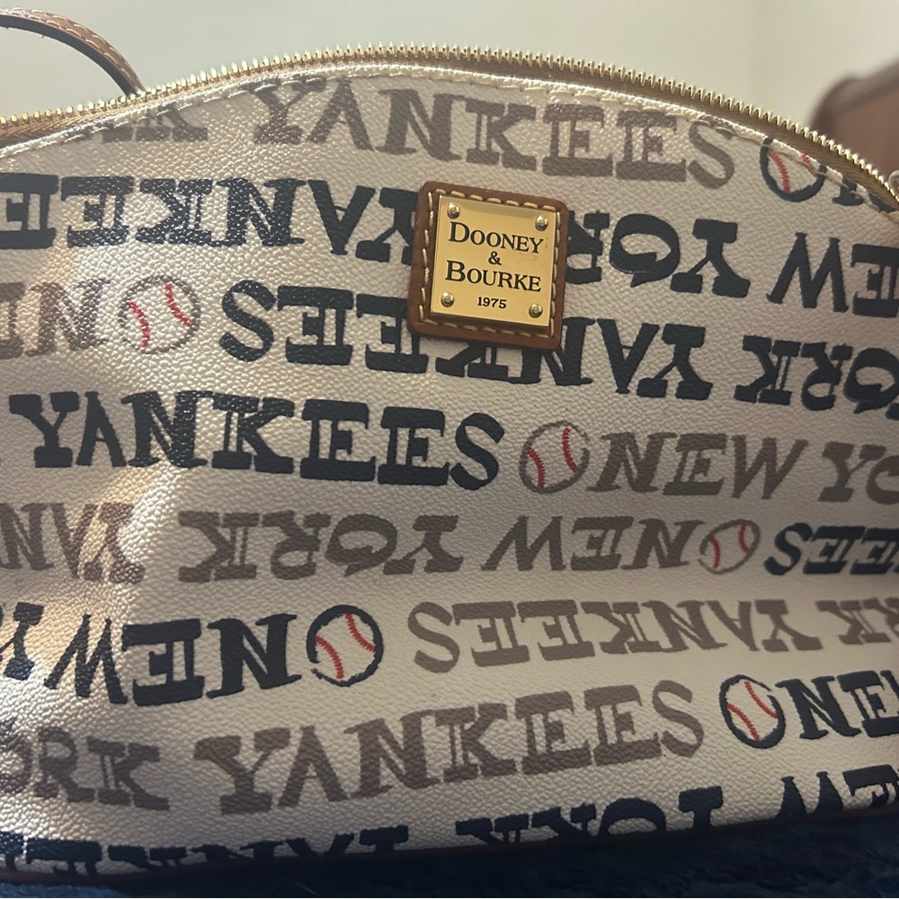 Never used. Like brand new New York Yankees Dooney and Bourke Purse